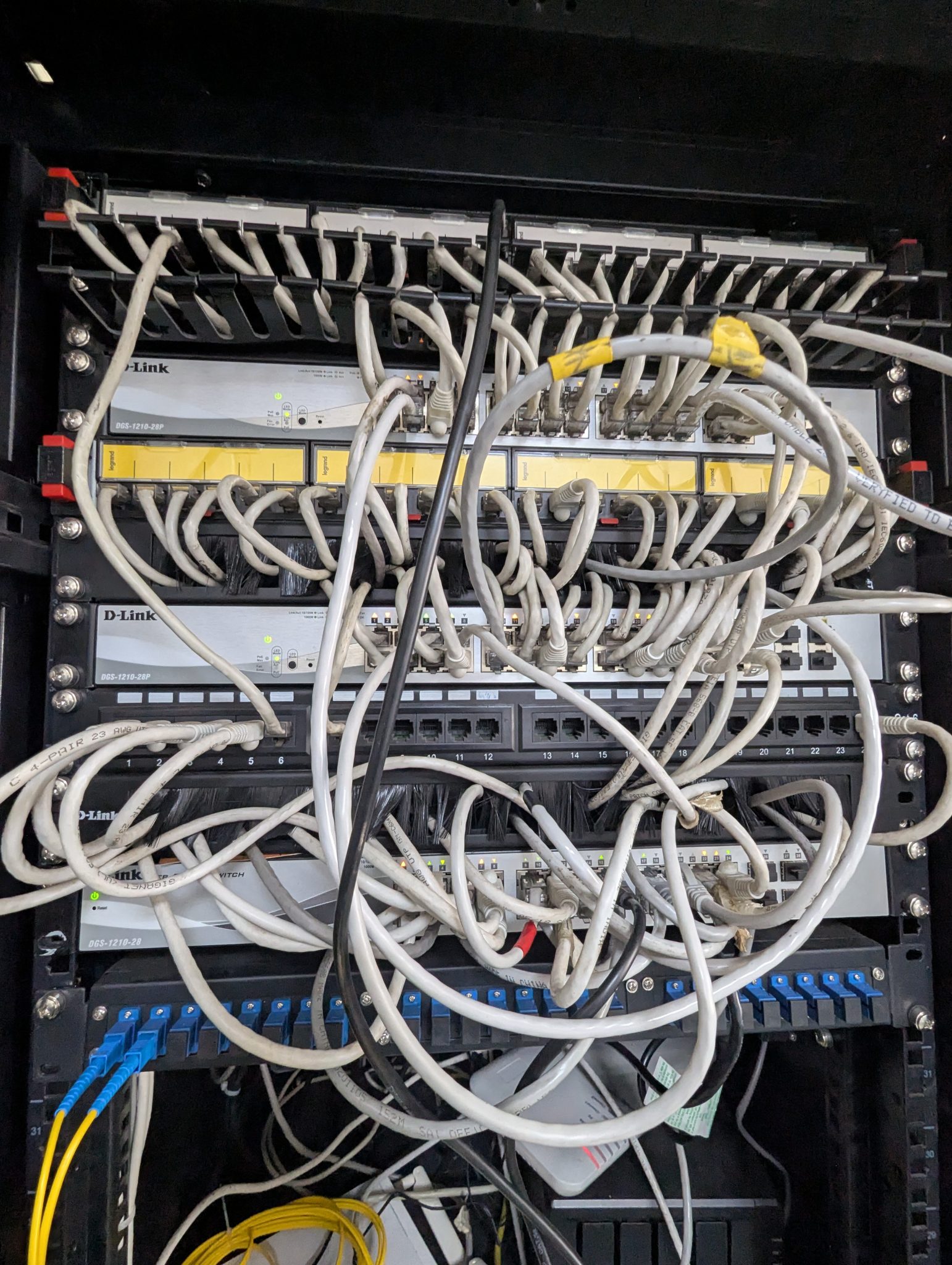 Network rack and cabling used to symbolize inference traffic pathways